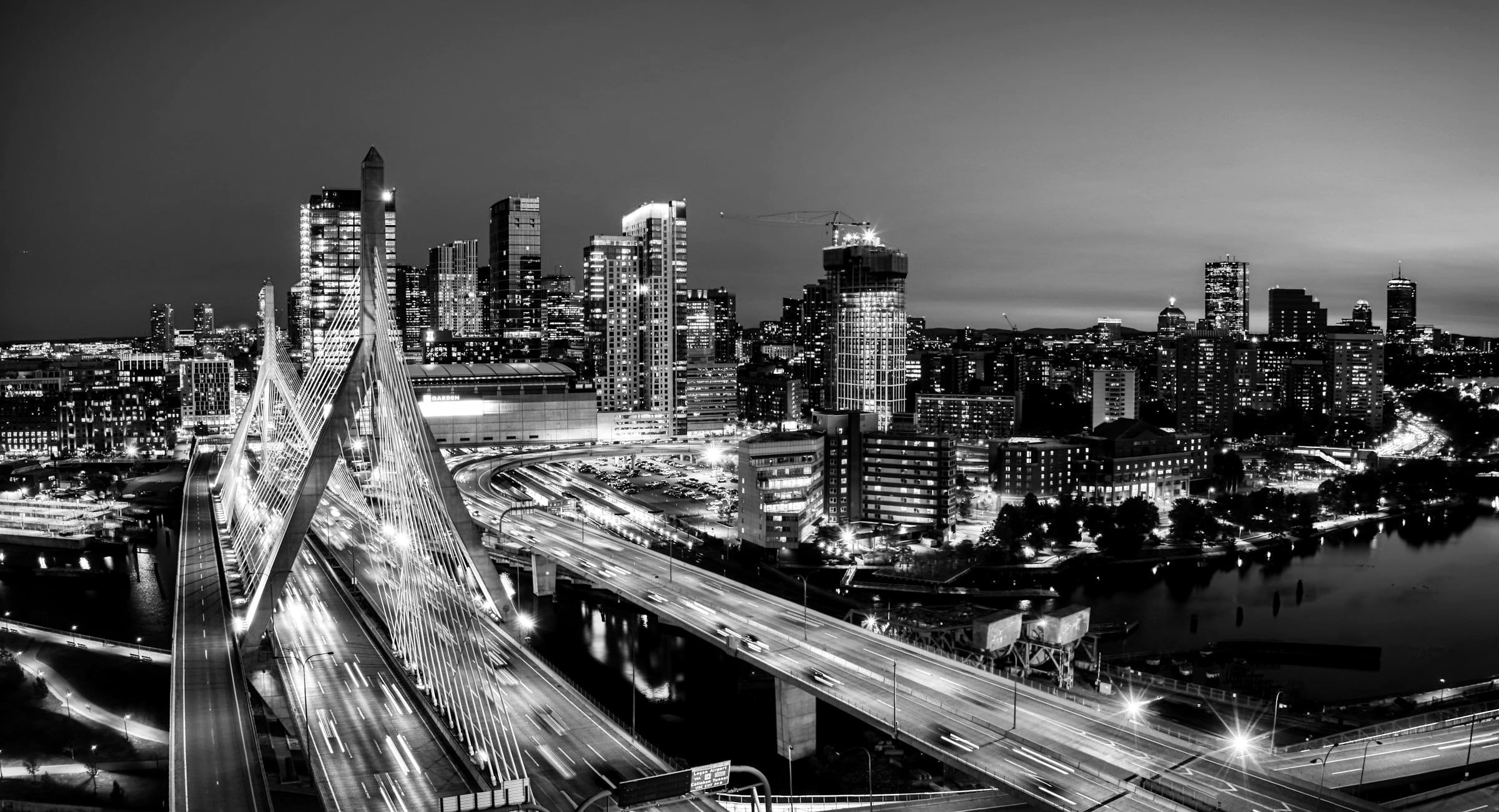 Boston at night, the Zakim Bridge and the skyline lit up
